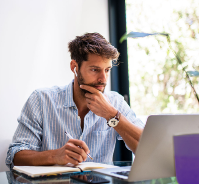 Man looking at his laptop